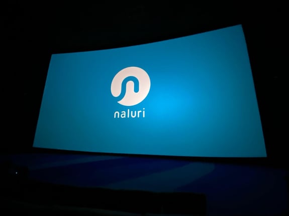 The Naluri logo on a cinema screen
